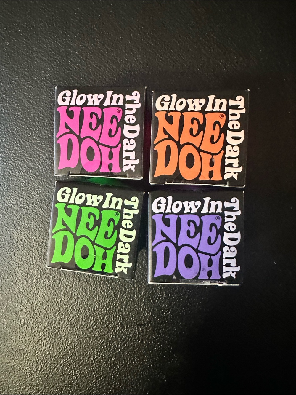 NeeDoh Glow in the Dark Stress Ball - Pink, Orange, Green, or Purple - mini